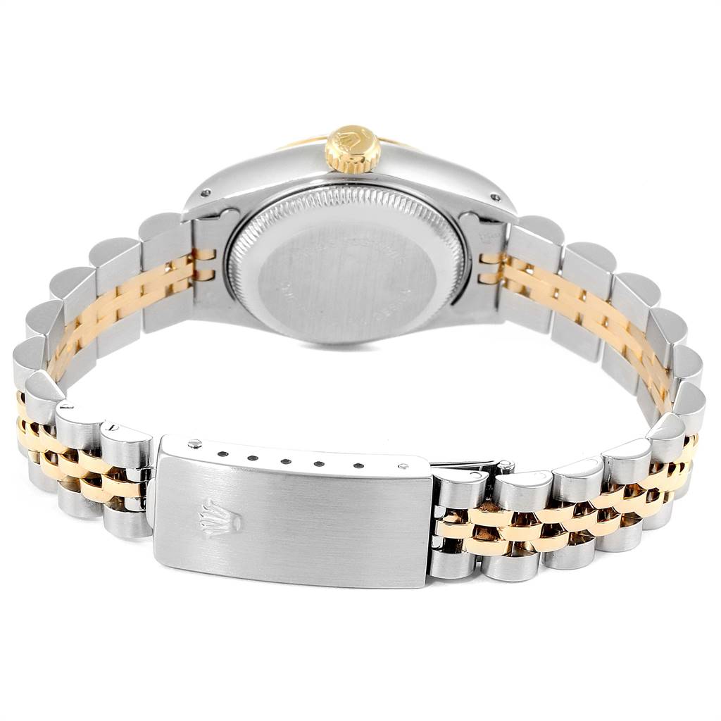 The image shows the back of a Rolex Datejust 69173 Women's Stainless Steel White Dial 69173 Women's Stainless Steel White Dial watch, featuring a stainless steel and gold Jubilee bracelet and the closed clasp.
