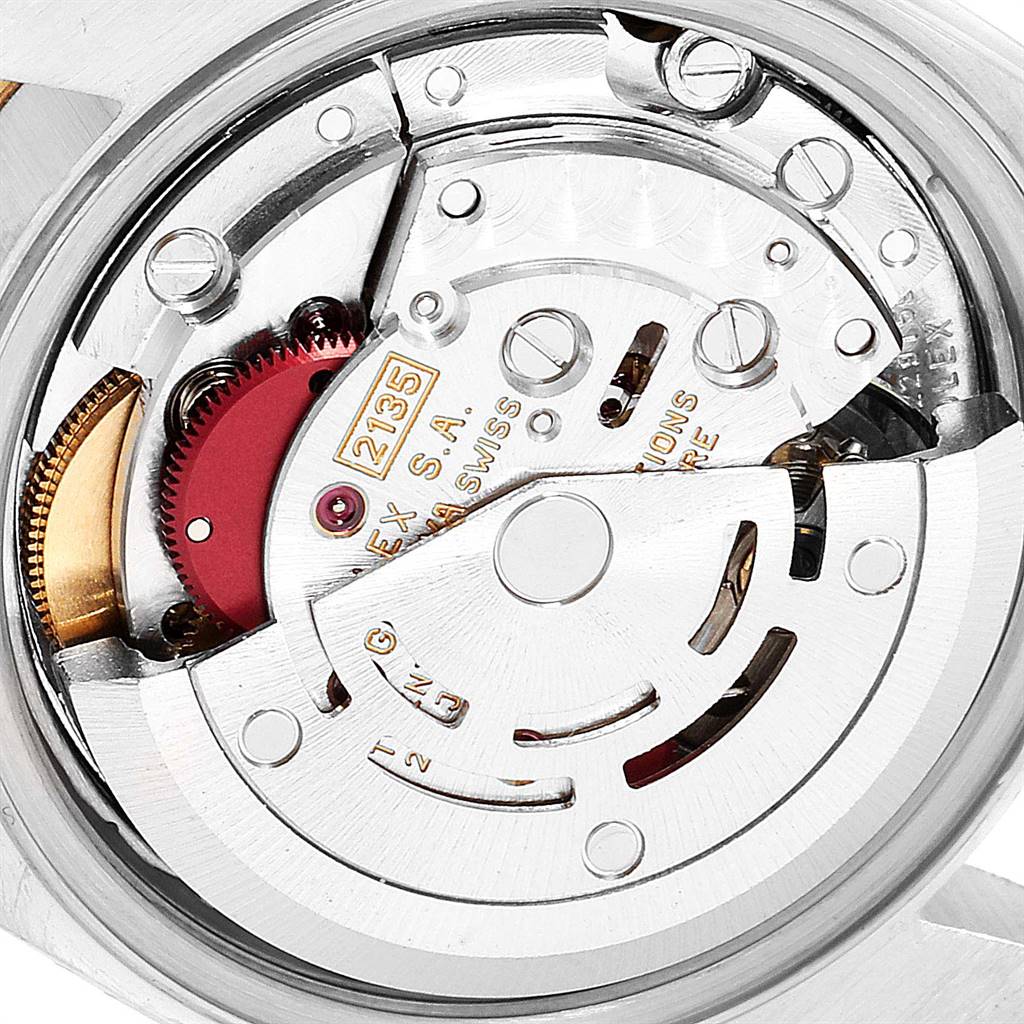This image shows a close-up of the movement mechanism of a Rolex Datejust 69173 Women's Stainless Steel Champagne Dial 69173 Women's Stainless Steel Champagne Dial watch.