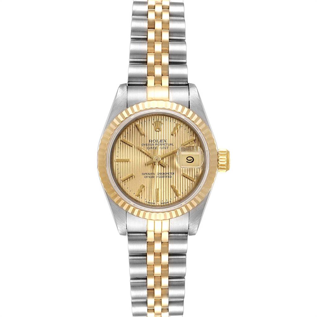 This image shows a Rolex Datejust 69173 Women's Stainless Steel Champagne Dial 69173 Women's Stainless Steel Champagne Dial watch from the front, featuring its two-tone bracelet, cyclops date window and fluted bezel.