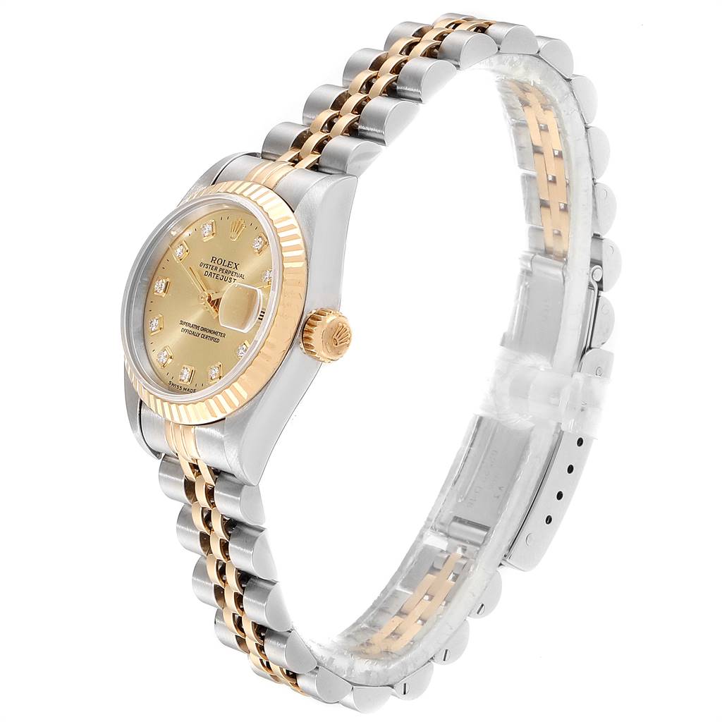 The Rolex Datejust 69173 Women's Stainless Steel Champagne Dial 69173 Women's Stainless Steel Champagne Dial watch is shown at a side angle, displaying its gold and silver bracelet, crown, and champagne-colored dial.