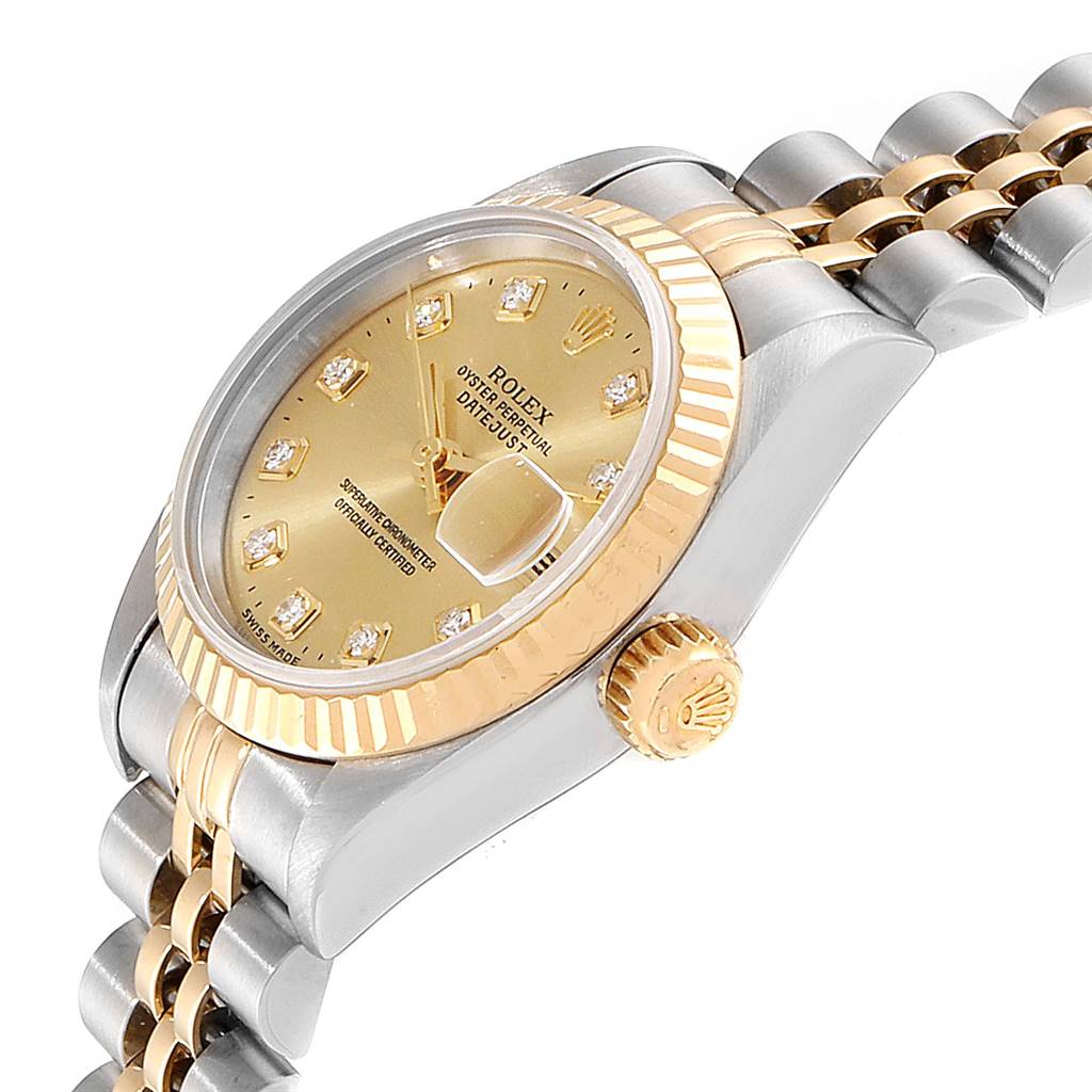 This Rolex Datejust 69173 Women's Stainless Steel Champagne Dial 69173 Women's Stainless Steel Champagne Dial watch is shown at an angled side view, displaying the dial, fluted bezel, oyster case, and jubilee bracelet.