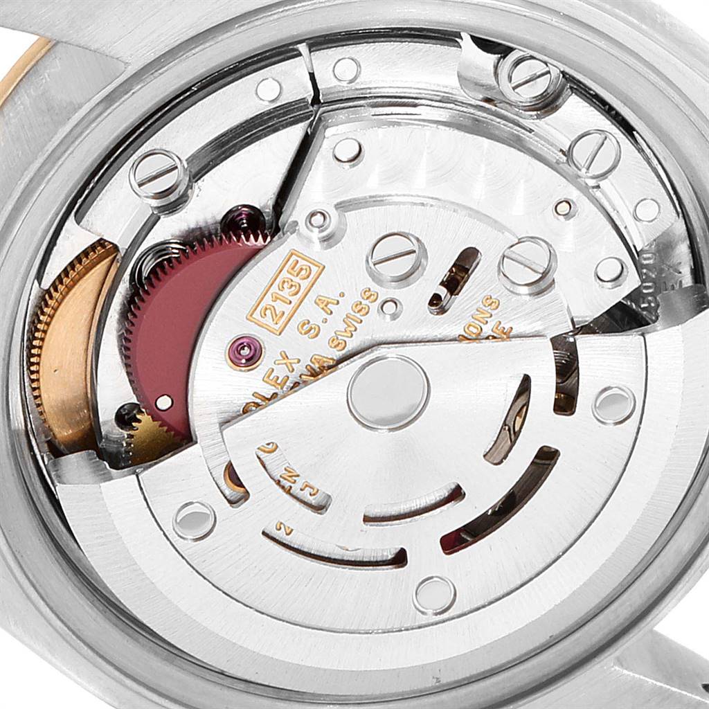 The image shows a detailed close-up of the movement mechanism inside the back case of a Rolex Datejust 69173 Women's Steel and Gold (two tone) Champagne Dial 69173 Women's Steel and Gold (two tone) Champagne Dial watch.