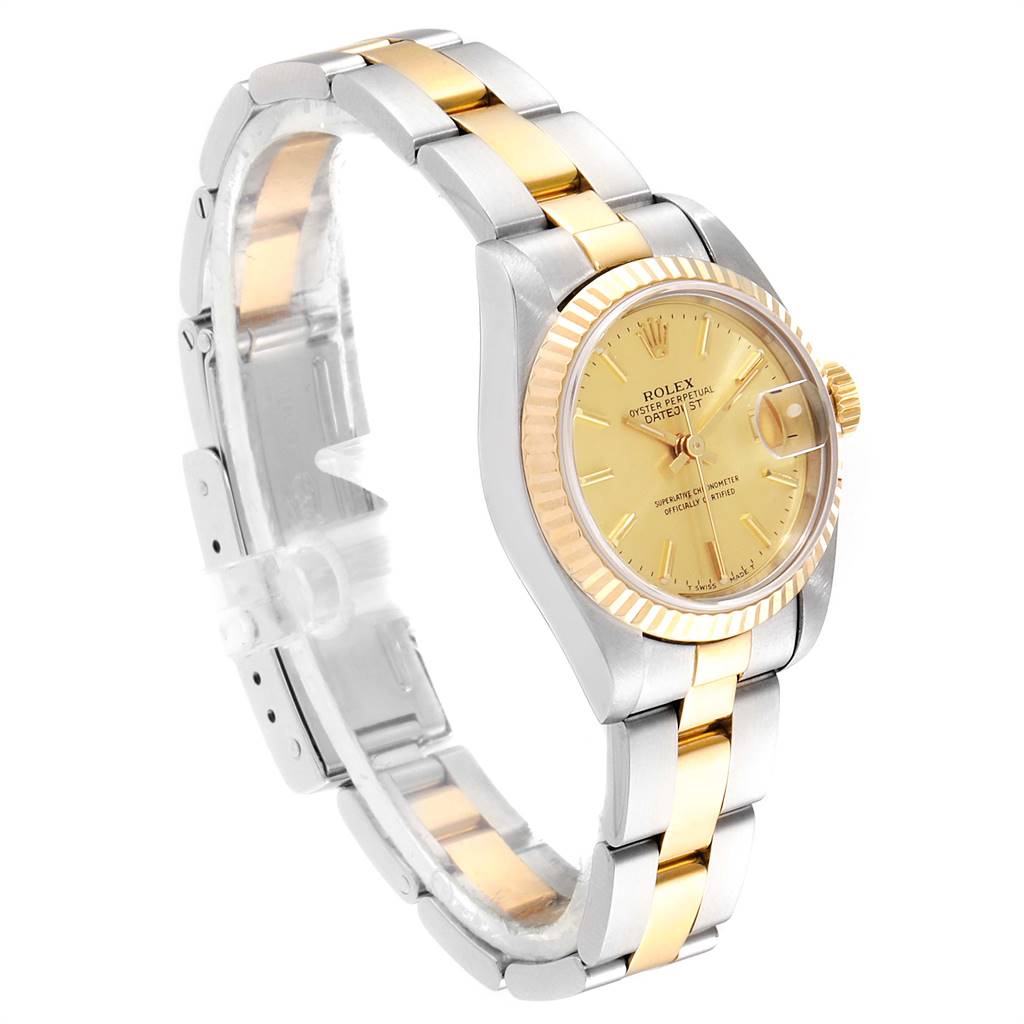 The Rolex Datejust 69173 Women's Steel and Gold (two tone) Champagne Dial 69173 Women's Steel and Gold (two tone) Champagne Dial watch is shown at a slight angle, featuring its bracelet, case, dial, and the crown.