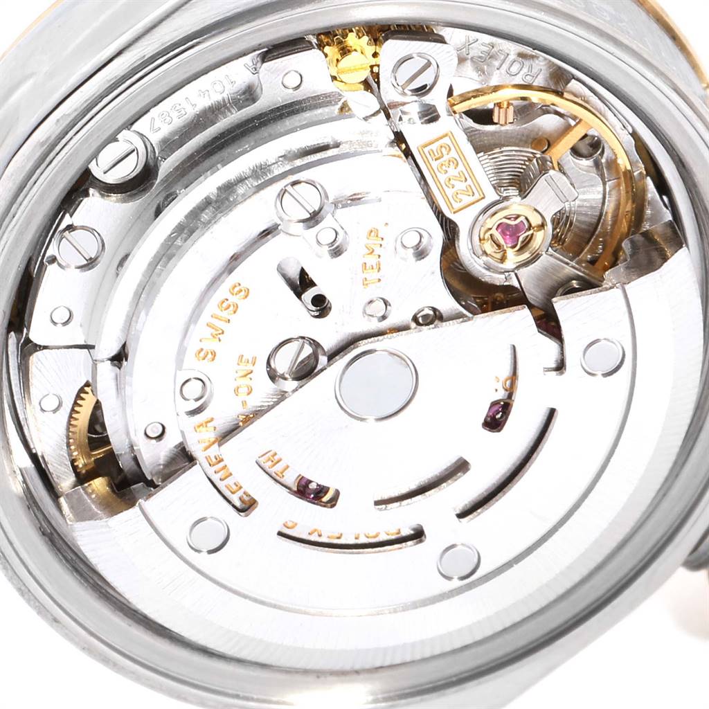 This is a close-up view of the movement mechanism of a Rolex Datejust 79163 Women's Steel and Gold (two tone) Champagne Dial 79163 Women's Steel and Gold (two tone) Champagne Dial watch.