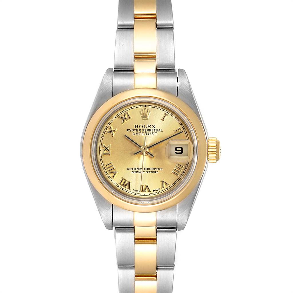 This image shows a front angle of a Rolex Datejust 79163 Women's Steel and Gold (two tone) Champagne Dial 79163 Women's Steel and Gold (two tone) Champagne Dial watch, highlighting its gold dial, date display, and two-tone metal bracelet.