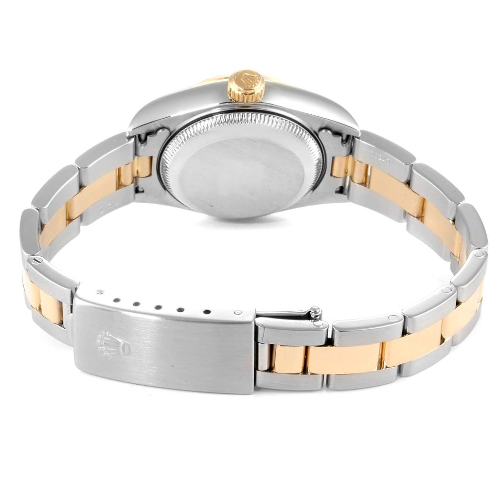 The image shows the back of a Rolex Datejust 79163 Women's Steel and Gold (two tone) Champagne Dial 79163 Women's Steel and Gold (two tone) Champagne Dial watch, including its clasp, bracelet, and case back.
