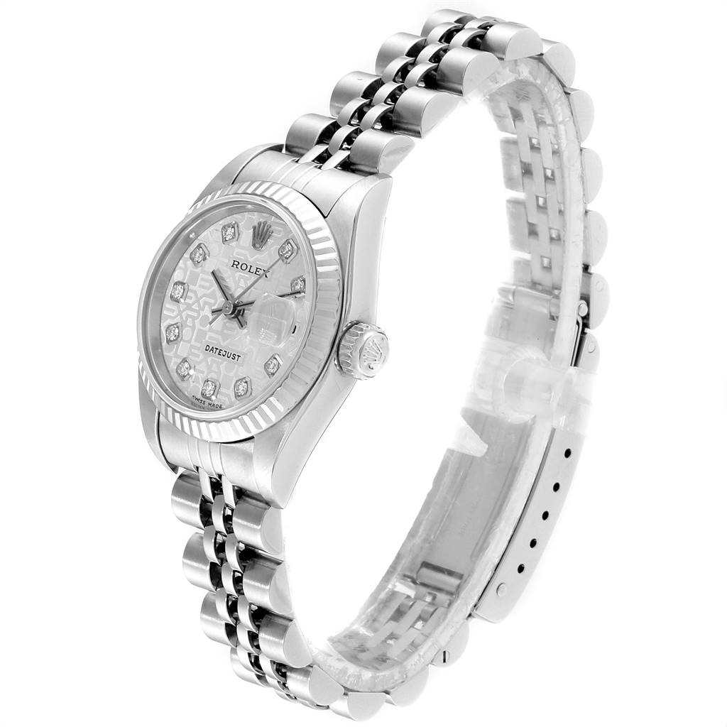 This image displays a side angle of the Rolex Datejust 79174 Women
s Stainless Steel Silver Dial 79174 Women
s Stainless Steel Silver Dial watch, showing the face, dial, case, and partially the bracelet.