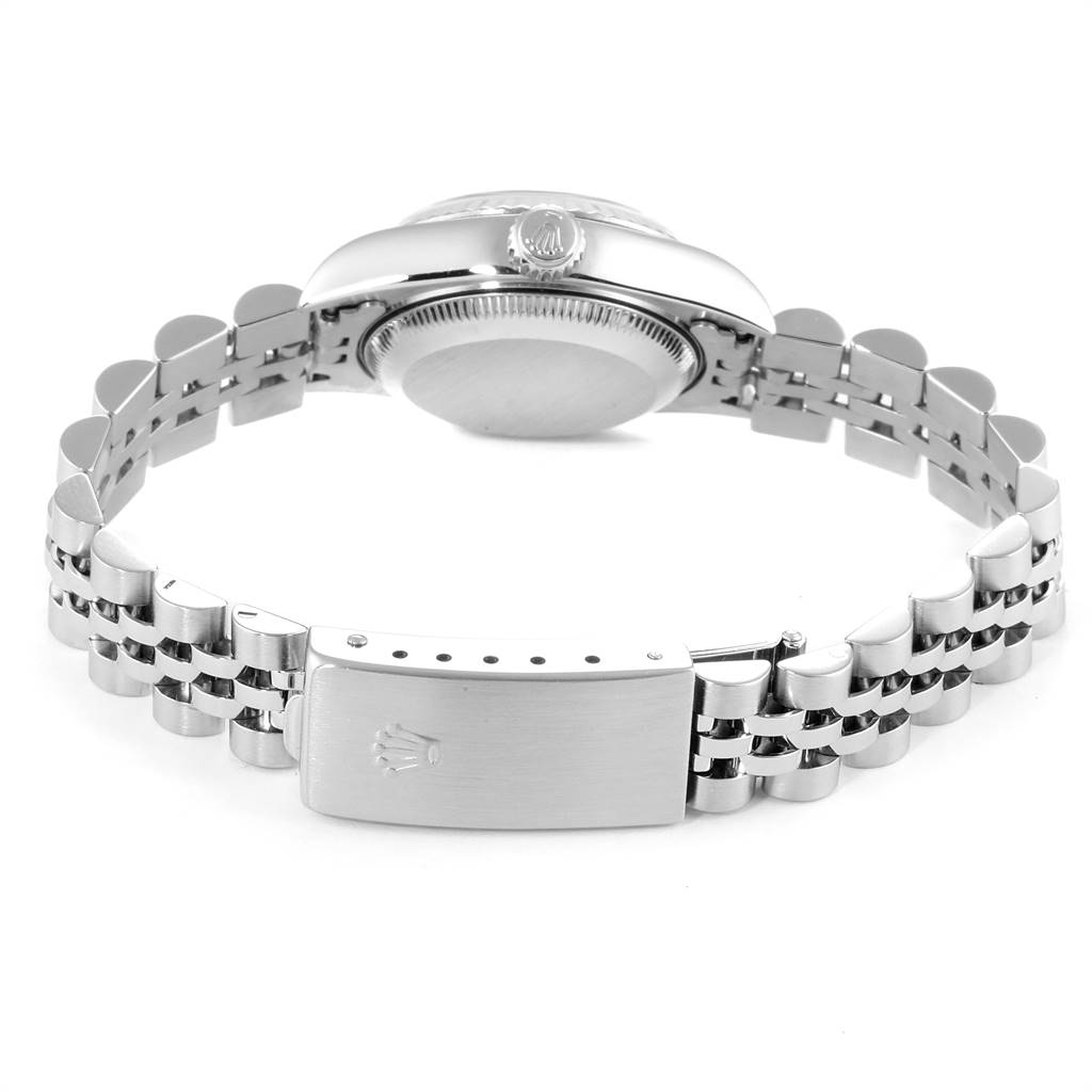 The image shows the back of a Rolex Datejust 79174 Women's Stainless Steel Blue Dial 79174 Women's Stainless Steel Blue Dial watch, specifically highlighting the clasp and bracelet adjustment holes.