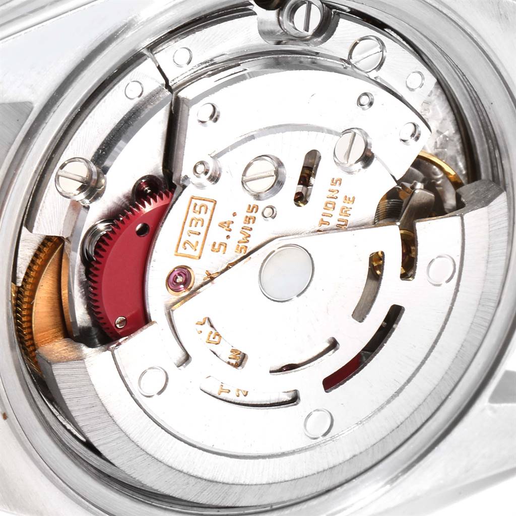 The image shows the movement mechanism of a Rolex Datejust 69173 Women
s Stainless Steel Champagne Dial 69173 Women
s Stainless Steel Champagne Dial watch from a close-up, rear angle.
