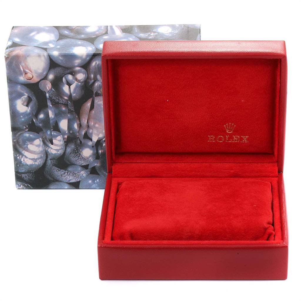 This image shows an empty red Rolex watch box and a decorative outer box for the Rolex Datejust 69173 Women
s Stainless Steel Blue Dial 69173 Women
s Stainless Steel Blue Dial model.