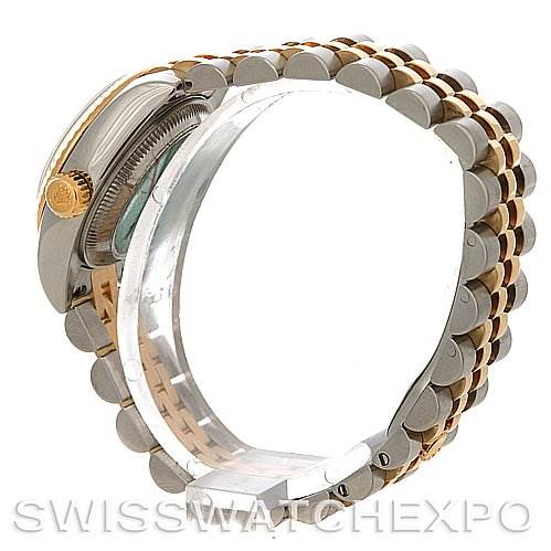 The image shows a side view of the Rolex Datejust 179173 Women's Steel and Gold (two tone) White Dial 179173 Women's Steel and Gold (two tone) White Dial, highlighting its case, crown, and two-tone bracelet.