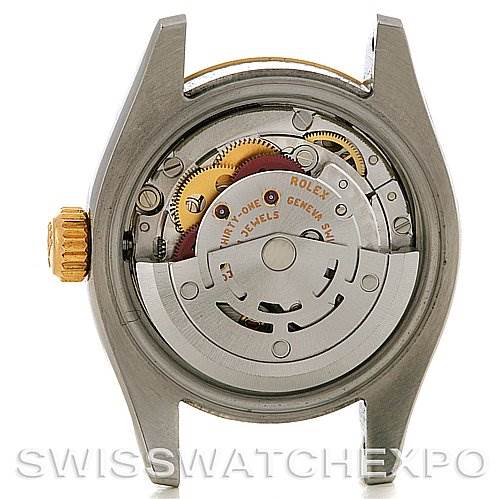 The image shows the internal movement mechanism of a Rolex Datejust 179173 Women's Steel and Gold (two tone) White Dial 179173 Women's Steel and Gold (two tone) White Dial watch from the back angle.