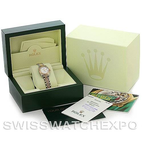 This image shows a Rolex Datejust 179173 Women's Steel and Gold (two tone) White Dial 179173 Women's Steel and Gold (two tone) White Dial watch in its box, along with booklets and a guarantee certificate.
