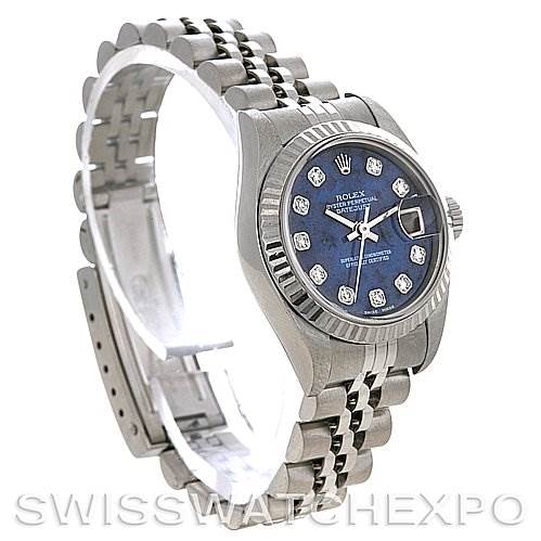 This image shows a Rolex Datejust 79174 Women's Stainless Steel Blue Dial 79174 Women's Stainless Steel Blue Dial watch at a slightly tilted angle, displaying its face, bezel, crown, and part of the bracelet.