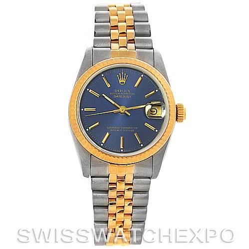 The image shows a Rolex Datejust 68273 Women's Stainless Steel Blue Dial 68273 Women's Stainless Steel Blue Dial watch from a front angle, showcasing its blue dial, gold bezel, and two-tone bracelet.