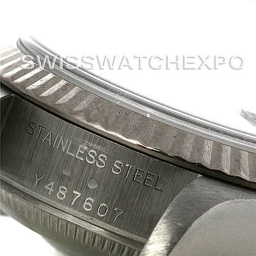 The image shows a close-up of the side of a Rolex Datejust 79174 Women's Stainless Steel White Dial 79174 Women's Stainless Steel White Dial, focusing on the case and bezel with the serial number visible.