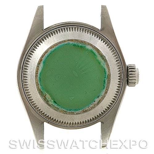 This image shows the back case of a Rolex Datejust 69174 Women's Stainless Steel Black Dial 69174 Women's Stainless Steel Black Dial model watch from a top-down angle.