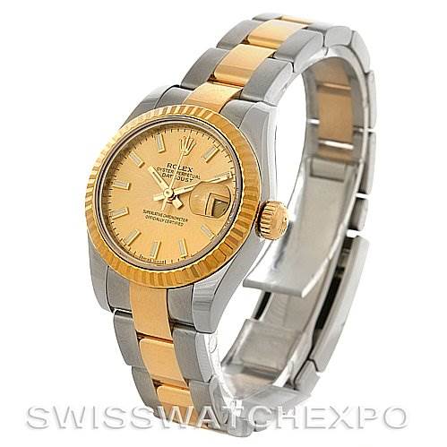 The image shows a Rolex Datejust 179173 Women's Steel and Gold (two tone) Champagne Dial 179173 Women's Steel and Gold (two tone) Champagne Dial model at an angle highlighting the front of the watch, bracelet, and partially opened clasp.