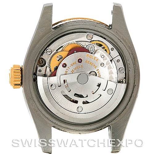 This image shows the internal movement of a Rolex Datejust 179173 Women's Steel and Gold (two tone) Champagne Dial 179173 Women's Steel and Gold (two tone) Champagne Dial watch with the back case removed.