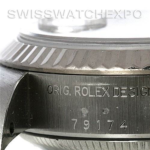 This image shows a close-up of the case side and bezel of a Rolex Datejust 79174 Women's Stainless Steel Mother of Pearl Dial 79174 Women's Stainless Steel Mother of Pearl Dial, displaying the model number 79174 engraving.
