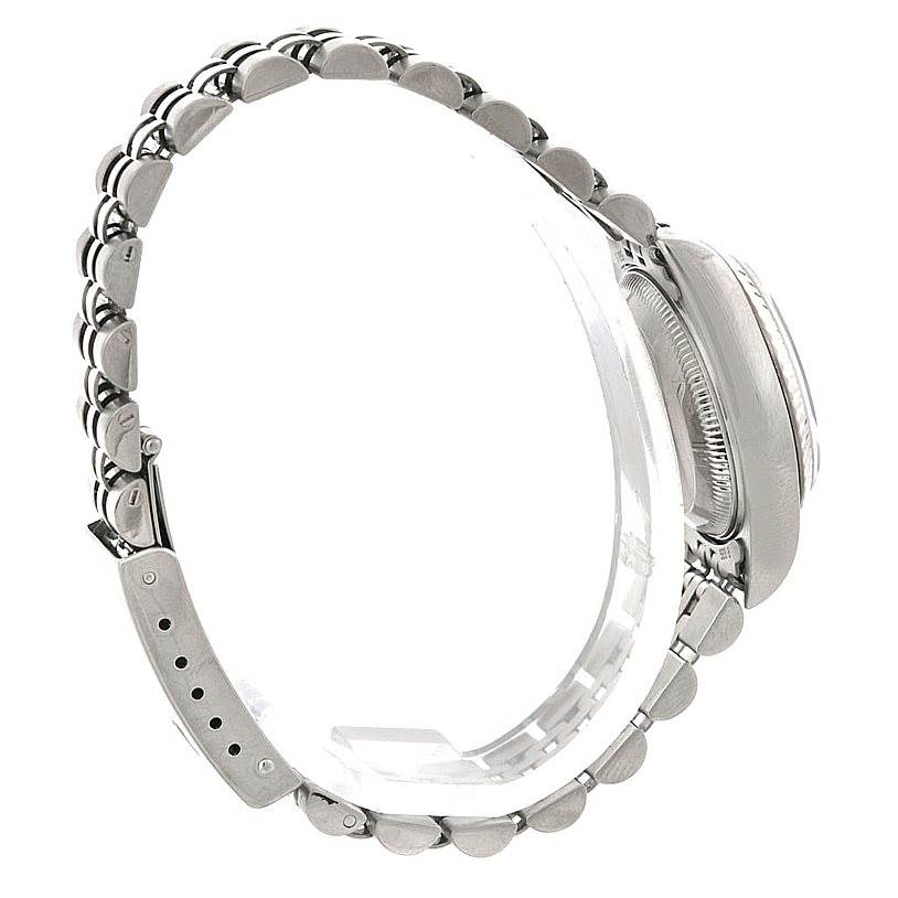 This image shows a side view of the Rolex Datejust 79174 Women
s Stainless Steel Blue Dial 79174 Women
s Stainless Steel Blue Dial watch, mainly highlighting the bracelet and part of the case.