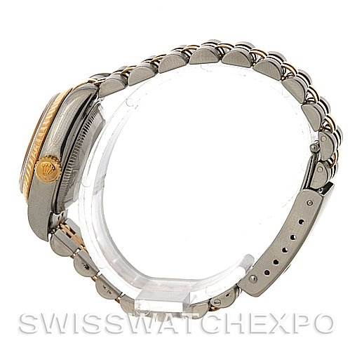 This side-view image of a Rolex Datejust 69173 Women's Stainless Steel Beige Dial 69173 Women's Stainless Steel Beige Dial watch displays the band, clasp, and partially the case, crown, and lugs.