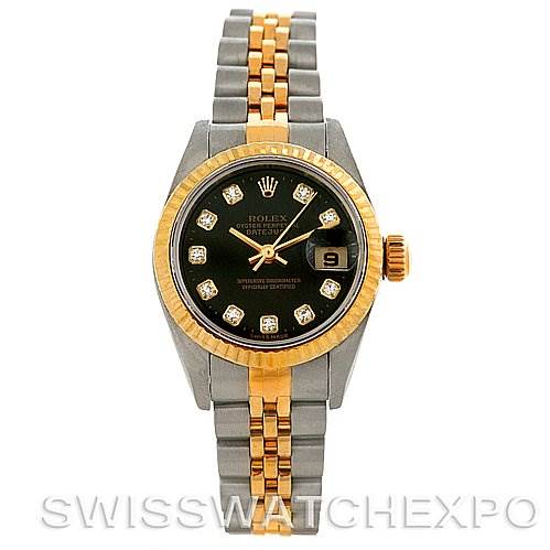The image shows a Rolex Datejust 79173 Women's Stainless Steel Black Dial 79173 Women's Stainless Steel Black Dial watch from a front view, featuring a black dial, gold bezel, and two-tone metal bracelet.