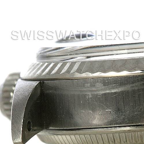 The image shows a detailed side view of the bezel and case of a Rolex Datejust 6917 Women
s Stainless Steel Silver Dial 6917 Women
s Stainless Steel Silver Dial watch.