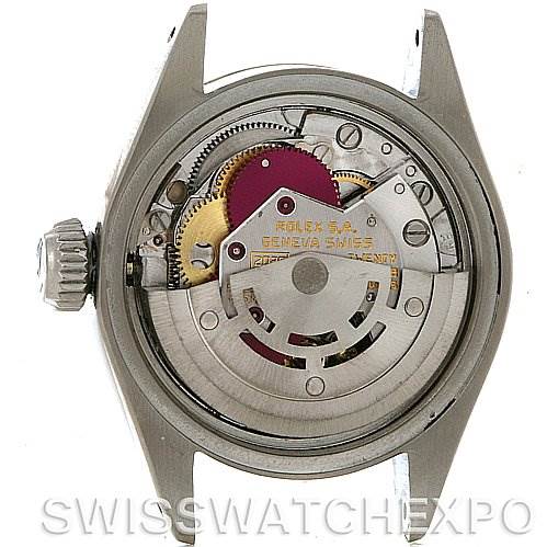 The image shows the back view of a Rolex Datejust 6917 Women
s Stainless Steel Silver Dial 6917 Women
s Stainless Steel Silver Dial model, revealing its internal movement mechanism.