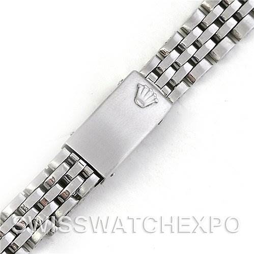 The image shows a close-up of a Rolex Datejust 6917 Women
s Stainless Steel Silver Dial 6917 Women
s Stainless Steel Silver Dial watch bracelet with a clasp, featuring the Rolex crown logo.