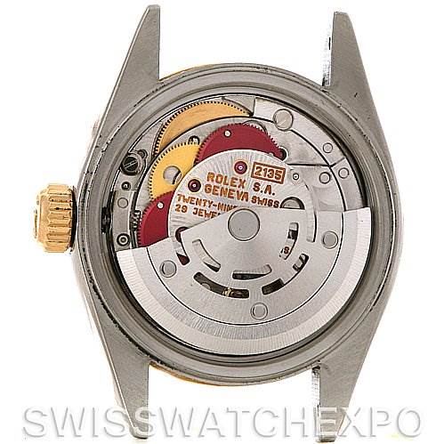 The image shows the back of a Rolex Datejust 69173 Women's Stainless Steel Champagne Dial 69173 Women's Stainless Steel Champagne Dial watch, highlighting its internal mechanism and movement parts.