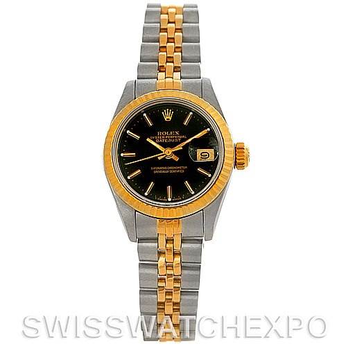 The image shows a Rolex Datejust 69173 Women's Stainless Steel Black Dial 69173 Women's Stainless Steel Black Dial watch from a front view, displaying its black dial, gold bezel, cyclops lens, and two-tone bracelet.