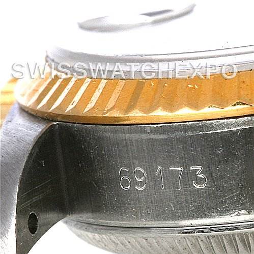 The image shows a close-up side view of a Rolex Datejust 69173 Women's Stainless Steel Black Dial 69173 Women's Stainless Steel Black Dial watch, focusing on its bezel and case with the model number 69173 visible.