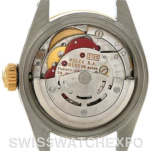 This image shows the internal mechanism of a Rolex Datejust 69173 Women's Stainless Steel Black Dial 69173 Women's Stainless Steel Black Dial watch from a rear angle, displaying the movement components.