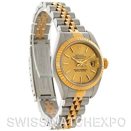 The image shows a Rolex Datejust 79173 Women's Stainless Steel Champagne Dial 79173 Women's Stainless Steel Champagne Dial watch at a slight angle, highlighting its gold and silver jubilee bracelet, champagne dial, and fluted bezel.