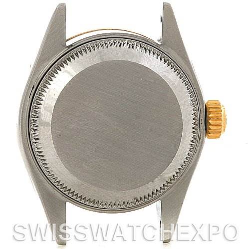 The image shows a Rolex Datejust 79173 Women's Stainless Steel Champagne Dial 79173 Women's Stainless Steel Champagne Dial watch case from the back, featuring the crown and the case back.