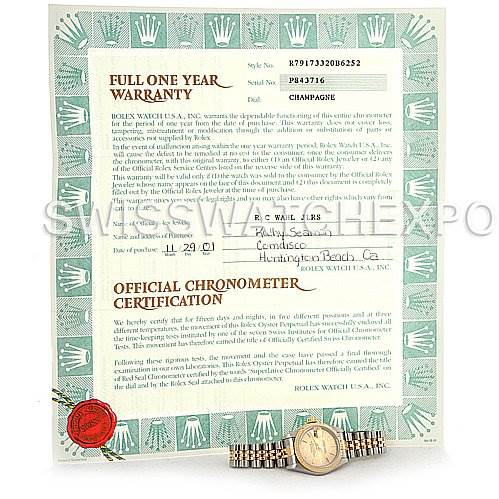 The image shows a Rolex Datejust 79173 Women's Stainless Steel Champagne Dial 79173 Women's Stainless Steel Champagne Dial model watch placed atop its full one-year warranty and Official Chronometer Certification documents.