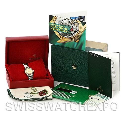 The image shows a Rolex Datejust 79173 Women's Stainless Steel Champagne Dial 79173 Women's Stainless Steel Champagne Dial watch in its box with accompanying accessories and documentation.