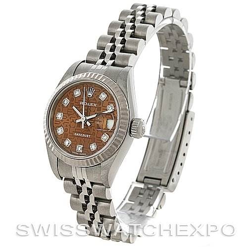 This image shows a Rolex Datejust 79174 Women's Stainless Steel Brown Dial 79174 Women's Stainless Steel Brown Dial watch at a three-quarter angle, highlighting the face, bezel, crown, and bracelet.