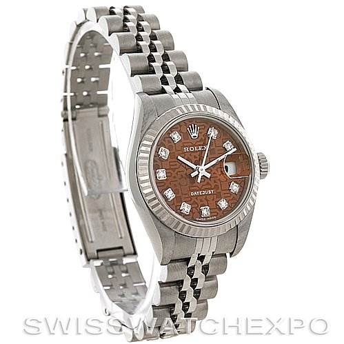 This image shows a Rolex Datejust 79174 Women's Stainless Steel Brown Dial 79174 Women's Stainless Steel Brown Dial watch featuring its bracelet, case, dial, and bezel, angled to display both the face and band details.