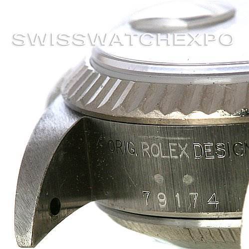 The image shows a close-up of the case and bezel of a Rolex Datejust 79174 Women's Stainless Steel Brown Dial 79174 Women's Stainless Steel Brown Dial, focusing on the model number and "ORIG. ROLEX DESIGN" inscription.
