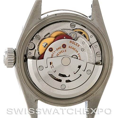 The image shows the back of a Rolex Datejust 79174 Women's Stainless Steel Brown Dial 79174 Women's Stainless Steel Brown Dial watch, highlighting its internal mechanical movement.