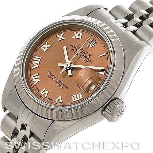 This Rolex Datejust 69174 Women's Stainless Steel Pink Dial 69174 Women's Stainless Steel Pink Dial watch is shown from an angled close-up view highlighting the dial, bezel, crown, and part of the bracelet.