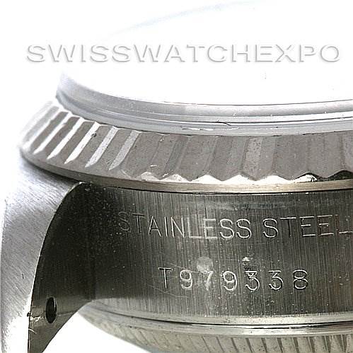 Close-up view of the case side and edge of the bezel of a Rolex Datejust 69174 Women's Stainless Steel Pink Dial 69174 Women's Stainless Steel Pink Dial watch, showing the serial number engraving.