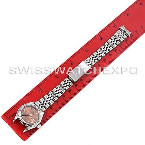 The image shows a Rolex Datejust 69174 Women's Stainless Steel Pink Dial 69174 Women's Stainless Steel Pink Dial watch with its bracelet and clasp, laid flat next to a ruler for scale.