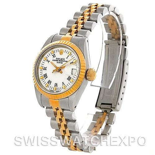 This image shows a Rolex Datejust 69173 Women's Stainless Steel White Dial 69173 Women's Stainless Steel White Dial watch from an angle displaying the face, bezel, and two-tone bracelet in silver and gold.