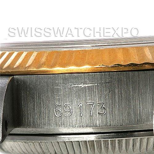 This image shows a close-up of the side of a Rolex Datejust 69173 Women's Stainless Steel White Dial 69173 Women's Stainless Steel White Dial model, focusing on the case with the model number 69173 engraved.