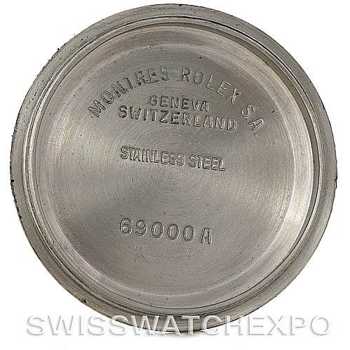 This image shows the inside of the stainless steel case back of a Rolex Datejust 69173 Women's Stainless Steel White Dial 69173 Women's Stainless Steel White Dial watch, engraved with brand details and model information.