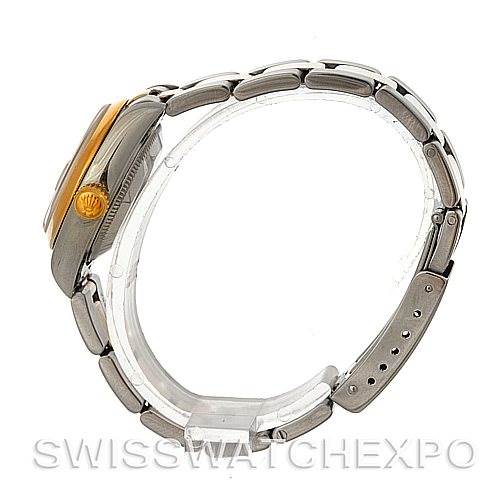 This side view of a Rolex Datejust 69163 Women's Stainless Steel Grey Dial 69163 Women's Stainless Steel Grey Dial watch showcases the bracelet, case, and crown.