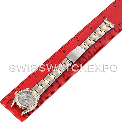 The image shows a fully extended Rolex Datejust 69163 Women's Stainless Steel Grey Dial 69163 Women's Stainless Steel Grey Dial watch, including its face and bracelet, laid next to a red ruler for scale.